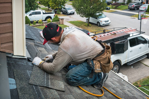 Professional Storm Damage Roof Repair technician working in Youngstown, NY
